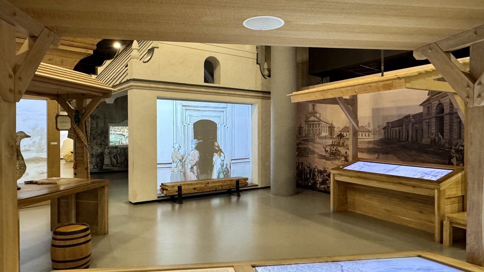 Projekcja multimedialna i stanowisko dotykowe w scenografii wystawy Muzeum POLIN